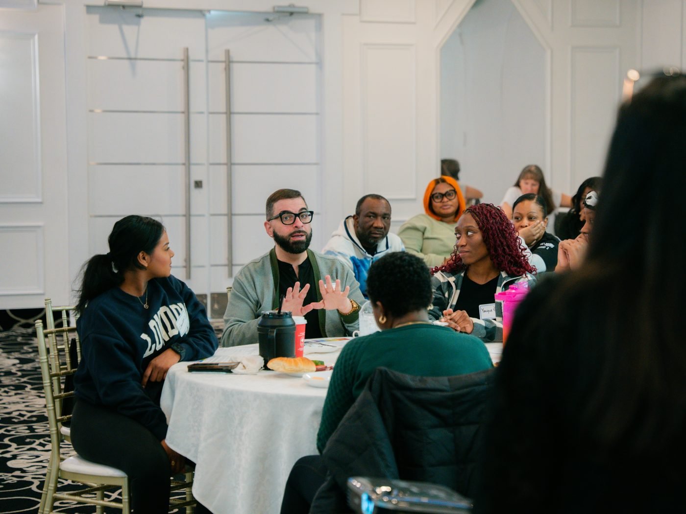 Leaders in discussion during a facilitation session